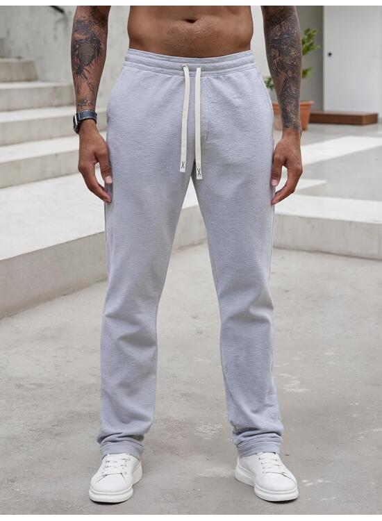 Pantalones deportivos de entrenamiento para hombre, cintura elástica, transpirables, con bolsillos