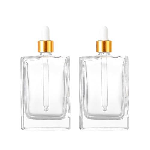 2pcs 50ml / 1.7oz botellas de gota de vidrio cuadrado transparente vacío con gota de ojos de oro botellas de aceites esenciales recargables perfumes frascos de muestra envase cosmético de viaje