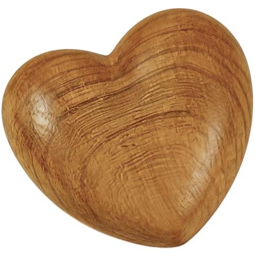 El Significado del Corazón de Bolsillo Tallado