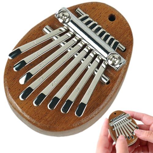 Descubre la magia musical en la palma de tu mano con el piano de pulgar de madera